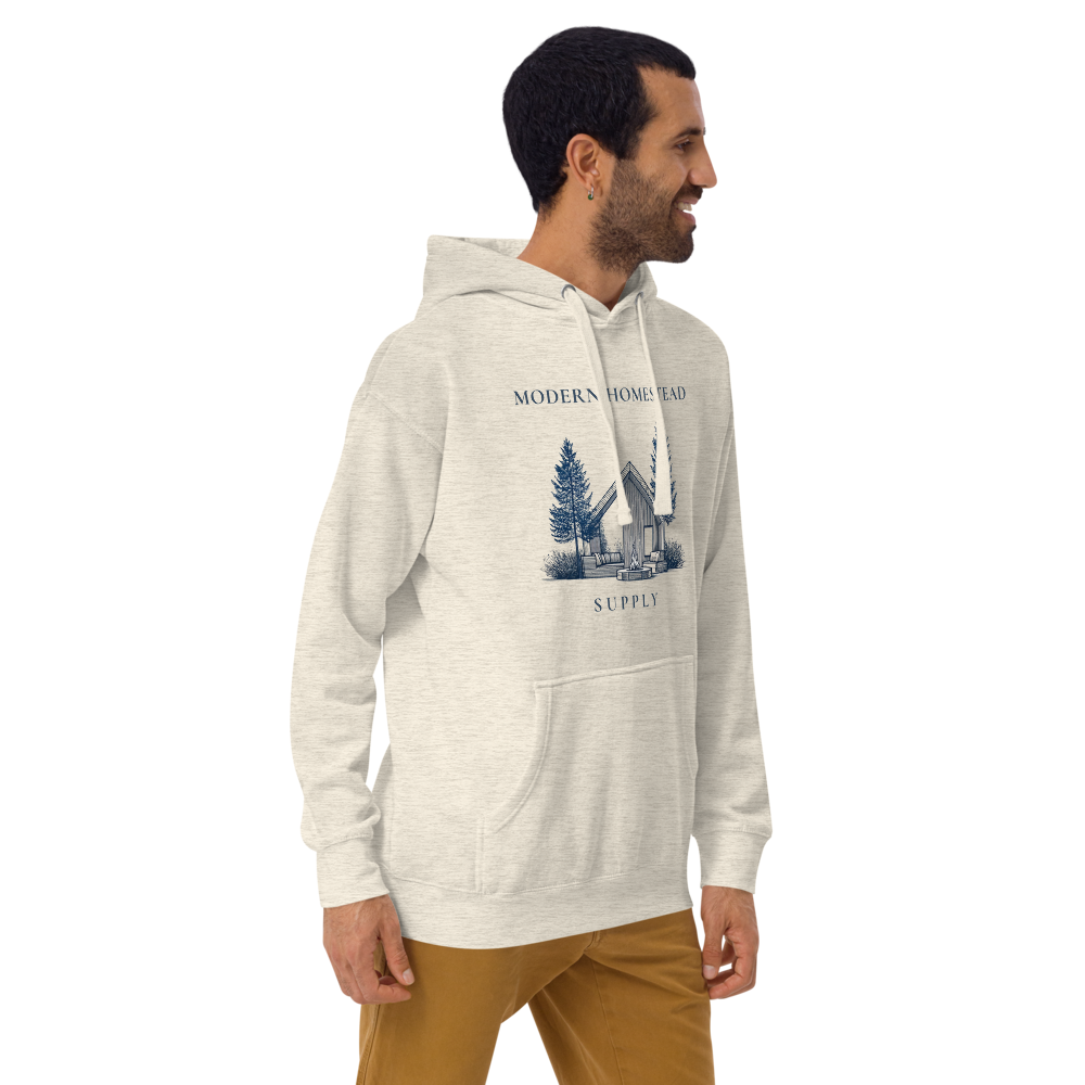 Man wearing a gray hoodie with a graphic design on a white background